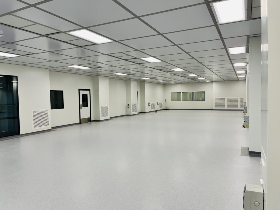 Precision panel walls and modular grid ceiling